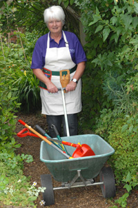 Use a wheelbarrow to carry tools