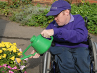 Watering sitting down