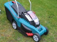 Cordless battery powered rotary mower